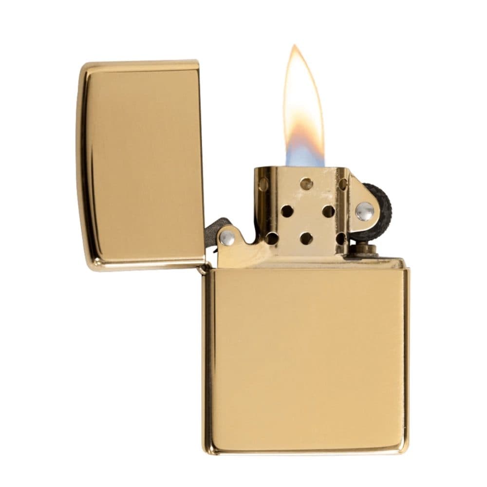 تصویر فندک Zippo طرح High Polish Brass با بدنه طلایی و براق