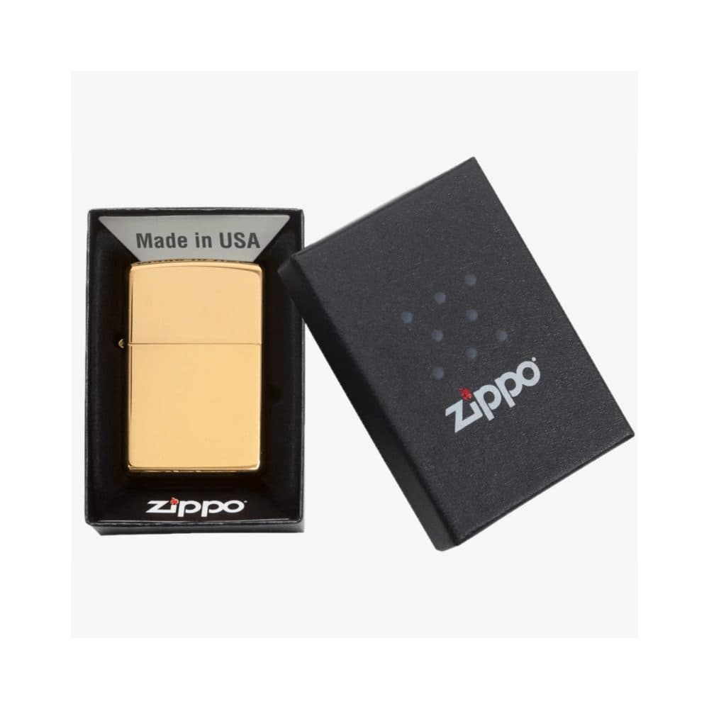تصویر فندک Zippo طرح High Polish Brass با بدنه طلایی و براق